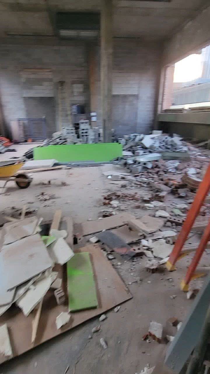 After: penthouse side opened up, ready for large windows